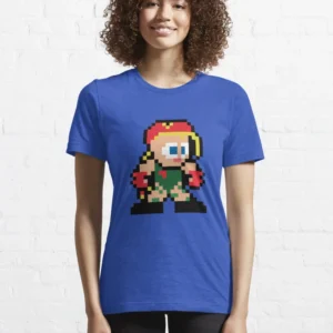 Femme qui porte un tee-shirt bleu électrique Street Fighter avec le personnage Cammy en pixels jaune et rouge